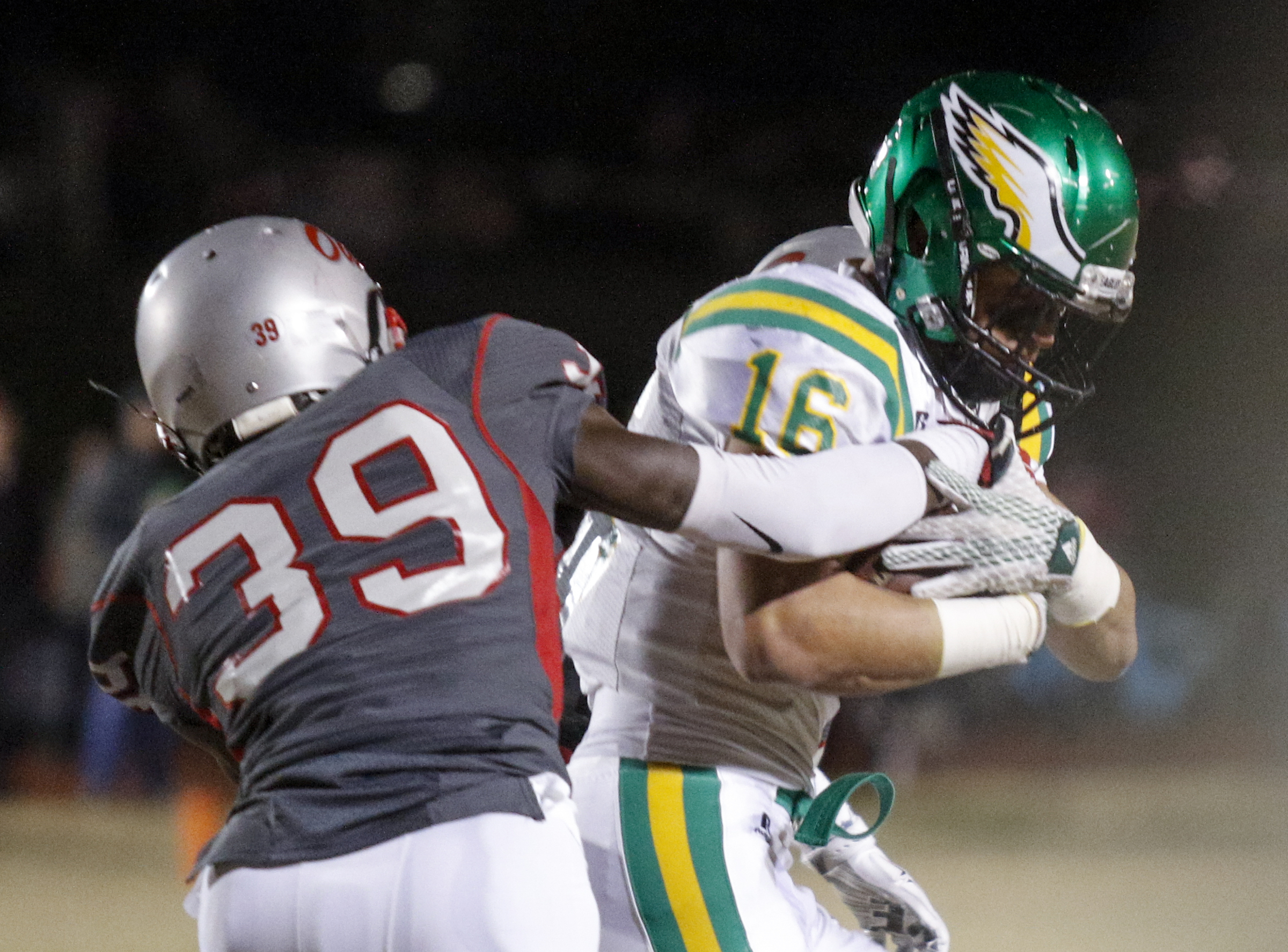 Ooltewah's Corey Morgan tackles Rhea County's Mason Stephenson during their TSSAA prep football playoff football game at Ooltewah High School on Friday, Nov. 20, 2015, in Ooltewah, Tenn.