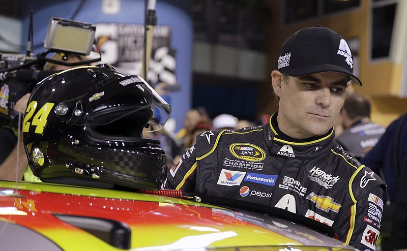 
              Jeff Gordon (24) prepares to get into his car before qualifying for the NASCAR Sprint Cup Series auto race Friday, Nov. 20, 2015, at Homestead-Miami Speedway in Homestead, Fla. (AP Photo/Terry Renna)
            