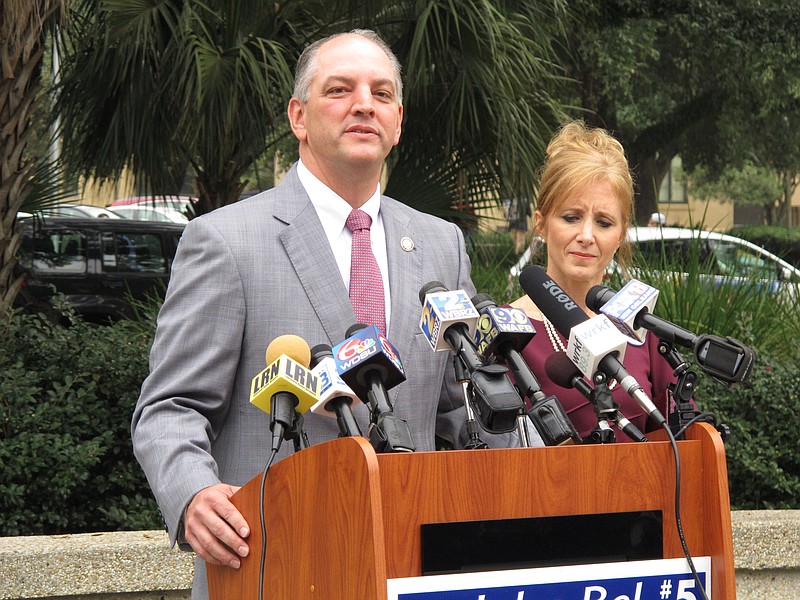 Democratic candidate for governor John Bel Edwards, with his wife Donna, speaks after Republican Lt. Gov. Jay Dardenne announced his endorsement of Edwards in the Louisiana governor's race on Thursday, Nov. 5, 2015, in Baton Rouge, La. 