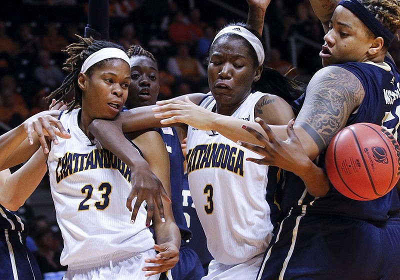 From left, UTC guard Moses Johnson, UTC forward Jasmine Joyner and Pittsburgh center Cora McManus compete for a rebound during their first-round matchup in last season's NCAA tournament at Thompson-Boling Arena in Knoxville.