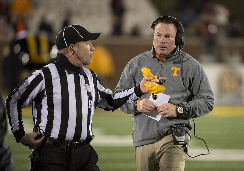 Tennessee head coach Butch Jones argues a call during the first quarter of an NCAA college football game against Missouri Saturday, Nov. 21, 2015, in Columbia, Mo. Tennessee won the game 19-8.  (AP Photo/L.G. Patterson)