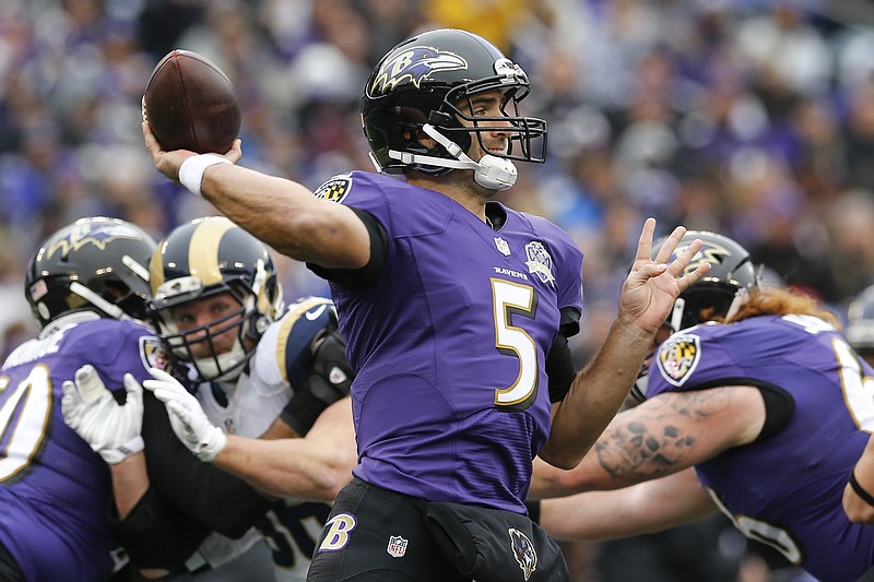 
              Baltimore Ravens quarterback Joe Flacco (5) passes the ball during the first half of an NFL football game against the St. Louis Rams in Baltimore, Sunday, Nov. 22, 2015. (AP Photo/Patrick Semansky)
            