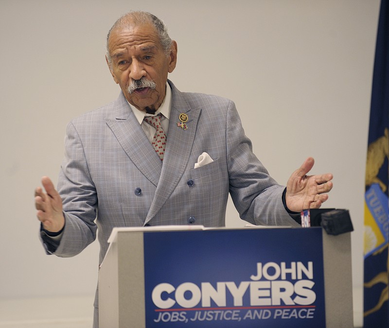 
              U.S. Rep John Conyers, D- Detroit, announces his plans for re-election at Redford Jaycees Hall in Redford, Mich., Monday, Nov. 23, 2015. Conyers declared his candidacy for a 27th consecutive term in Congress, Monday, saying he wants to continue pressing for employment opportunities and universal health care coverage. (Clarence Tabb Jr./ Detroit News via AP)
            