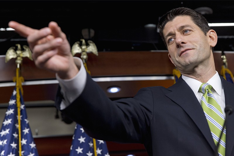 House Speaker Paul Ryan of Wis. calls on a reporter during a news briefing on Capitol Hill in Washingtonlast Thursday.