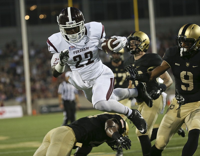 Fordham running back Chase Edmonds (22) scores a touchdown during the first half against Army on Sept. 4. He's run for 1,643 yards and scored 20 TDs this season.