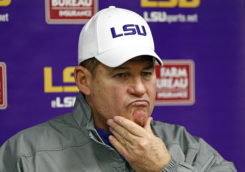 
              LSU head coach Les Miles ponders a reporter's question's following an NCAA college football game against Mississippi in Oxford, Miss., Saturday, Nov. 21, 2015. Mississippi won 38-17. (AP Photo/Rogelio V. Solis)
            