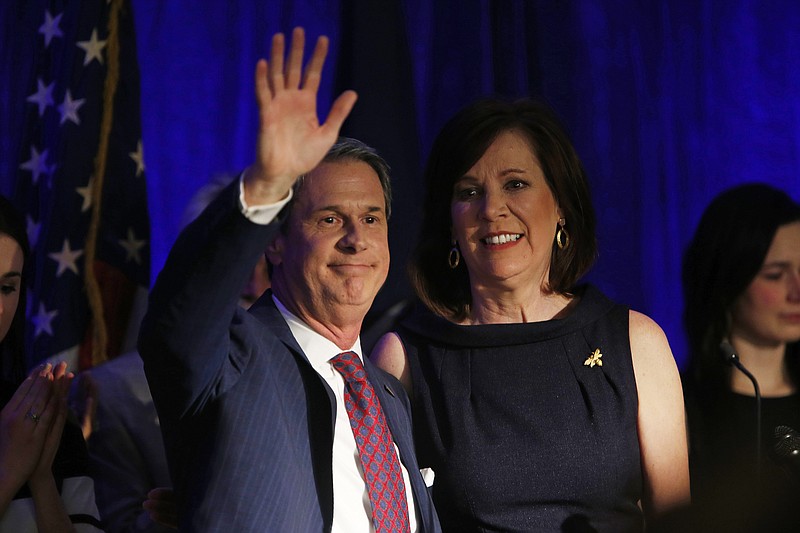 
              In this Nov. 21, 2015, photo, Sen. David Vitter, R-La., and his wife Wendy reacts to the crowd during his election night watch party in Kenner, La., Saturday, Nov. 21, 2015. Republicans’ plans to defend their Senate majority in 2016 just got a bit more complicated. Vitter’s loss in Louisiana’s governor’s race over the weekend, and his decision to leave the Senate next year rather than seek re-election, creates an open seat that Republicans will have to defend. (AP Photo/Max Becherer)
            