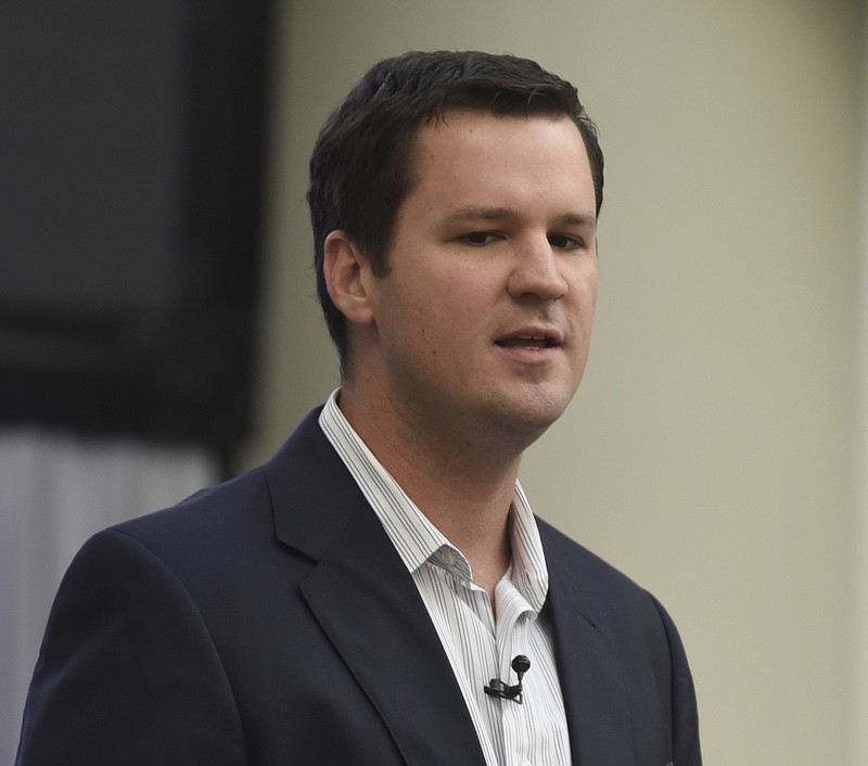 Graham Thomas of Tennessee Achieve speaks to Unum employees gathered at an event at the company's atrium on Tuesday, Oct. 28, 2015, in Chattanooga.