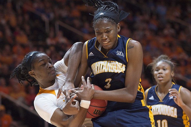 Tennessees Jasmine Jones and Chattanoogas Jasmine Joyner fight for control of the ball during an NCAA college basketball game Monday, Nov. 23, 2015, in Knoxville, Tenn. (Saul Young/Knoxville News Sentinel via AP) MANDATORY CREDIT