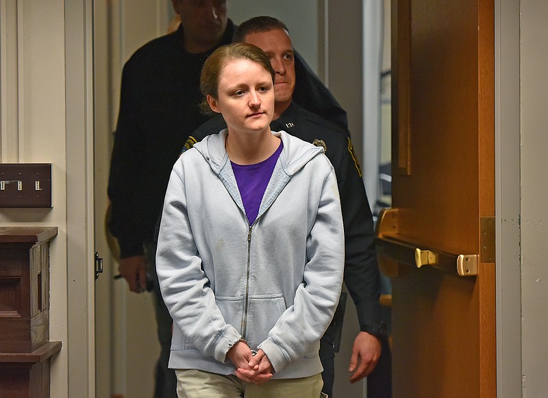 
              Tiffanie Irwin, pastor of the Word of Life Christian Church, arrives for an indictment hearing at the Oneida County Courthouse, Tuesday, Nov. 24, 2015, in Utica. N.Y. Irwin was among multiple people charged with murder for the death of Lucas Leonard and injuries to his brother, Christopher, during an attack at the church in October. (Mark DiOrio/Observer-Dispatch via AP)  ROME OUT; MANDATORY CREDIT
            