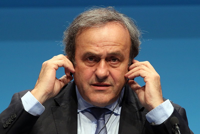 
              FILE - In this March 24, 2015 file photo UEFA President Michel Platini speaks during a news conference at the end of the 39th Ordinary UEFA Congress in Vienna, Austria. Platini's lawyer said Tuesday, Nov. 24, 2015 that FIFA ethics committee requests life ban for UEFA president Michel Platini. (AP Photo/Ronald Zak, file)
            