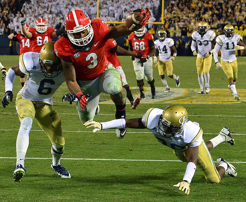 Former Georgia tailback Todd Gurley scored three touchdowns at Georgia Tech in 2013 to help turn a 20-0 deficit into a 41-34 double-overtime win.