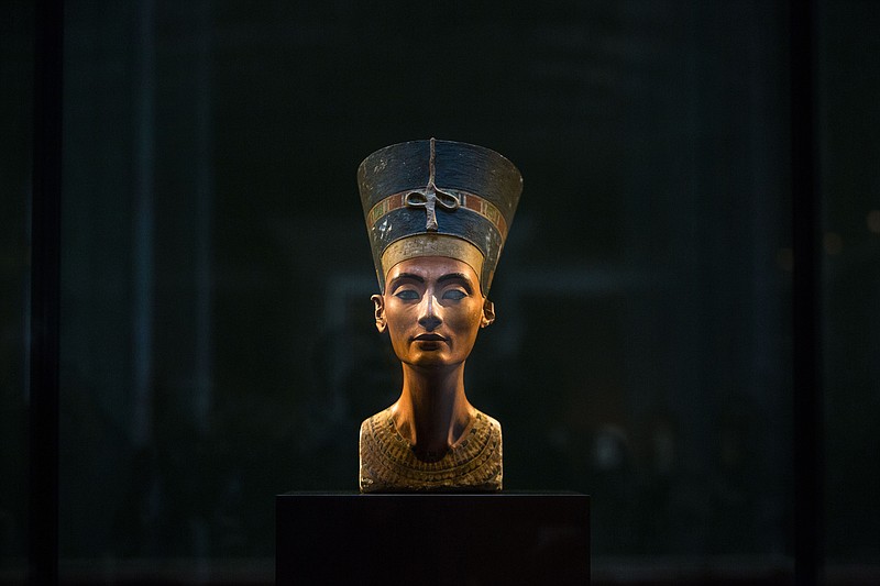 
              FILE - In this Sept. 10, 2014 file photo, a 3,300-year-old bust of Queen Nefertiti  is displayed at the New Museum in Berlin, Germany. Egypt’s antiquities ministry said on Thursday, Nov. 26, 2015 exploration has begun inside King Tutankhamun’s 3,300 year-old tomb, in the search for alleged hidden chambers, one of which may include Queen Nefertiti, according to a new theory. (AP Photo/Markus Schreiber, File)
            