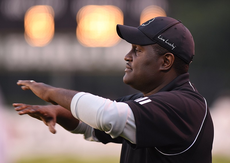 Notre Dame's Charles Fant coaches from the sideline in the game against East Ridge Friday, October 2, 2015 at Notre Dame High School.