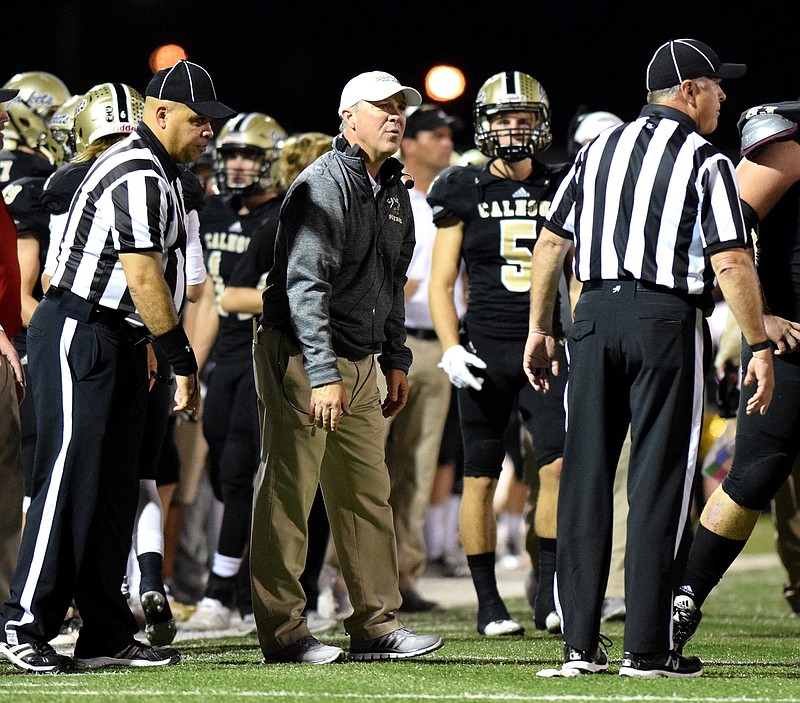 Calhoun head coach Hal Lamb disputes a call that gave Elbert County the ball after a Yellow Jacket fumble.  The Elbert County Blue Devils visited the Calhoun Yellow Jackets in a GHSA Football Playoff game on Friday November 27, 2015.