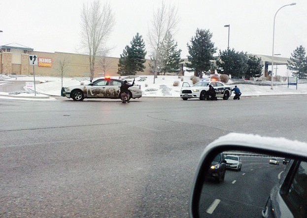 Authorities respond after reports of a shooting near a Planned Parenthood clinic Friday, Nov. 27, 2015, in Colorado Springs, Colo. (Kody Fisher/FOX21 News via AP) 