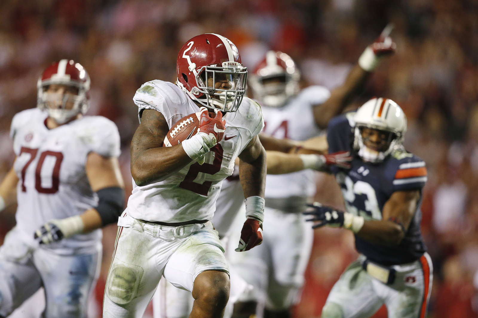 Alabama running back Derrick Henry (2) scores a touchdown in the second half of an NCAA college football game against Auburn, Saturday, Nov. 28, 2015, in Auburn, Ala. Alabama won 29-13. (AP Photo/Gerald Herbert)