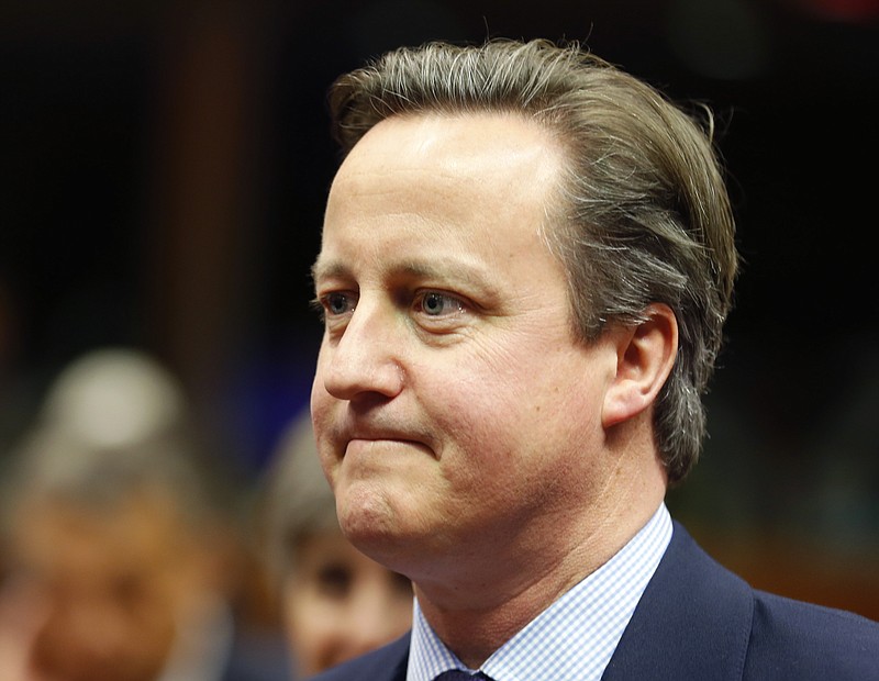 
              British Prime Minister David Cameron looks on during an EU-Turkey summit at the EU Council building in Brussels on Sunday, Nov. 29, 2015. At a high-profile summit in Brussels on Sunday, European Union leaders will look to offer Turkey 3 billion euros ($3.2 billion), an easing of visa restrictions and the fast-tracking of its EU membership process in return for tightening border security and take back some migrants who don't qualify for asylum.(AP Photo/Michael Probst)
            