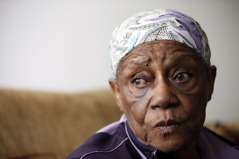 
              Levant Graham, 84, speaks during an interview in her apartment, Friday, Oct. 23, 2015, in Washington. Graham was forced out of her previous home by District of Columbia Housing Authority, and that house now stands vacant. The District of Columbia Housing Authority is moving aging tenants out of homes where they've lived for decades, renovating them and selling them to wealthy buyers. (AP Photo/Alex Brandon)
            