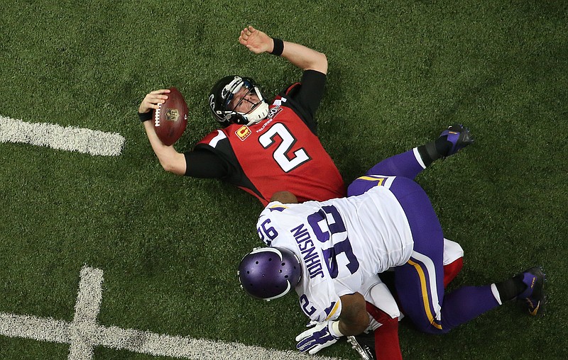  Atlanta Falcons quarterback Matt Ryan (2) lies on the field after being sacked against the Minnesota Vikings during the second half of an NFL football game, Sunday, Nov. 29, 2015, in Atlanta. The Minnesota Vikings won 20-10. (AP Photo/John Bazemore)