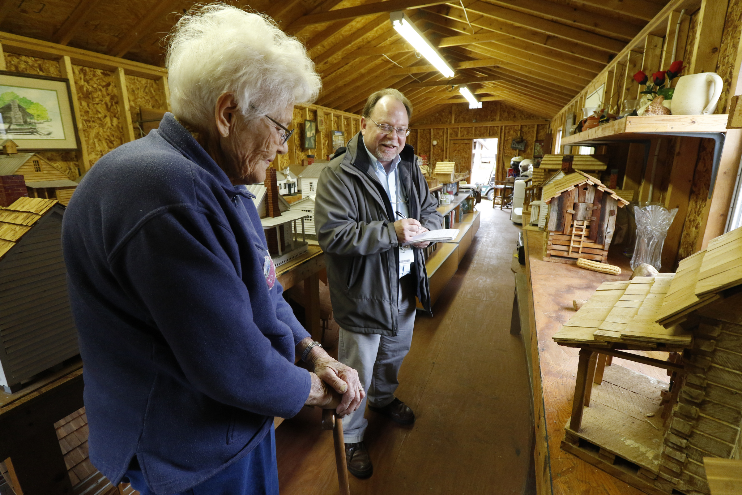 Staff Photo by Dan Henry / The Chattanooga Times Free Press- 11/25/15. Ben Benton interviews Nadean Kell as she speaks about her late husband Thaxton Kell who built miniature replicas of structures that were present in the Sequatchie Valley and surrounding areas when he was younger.