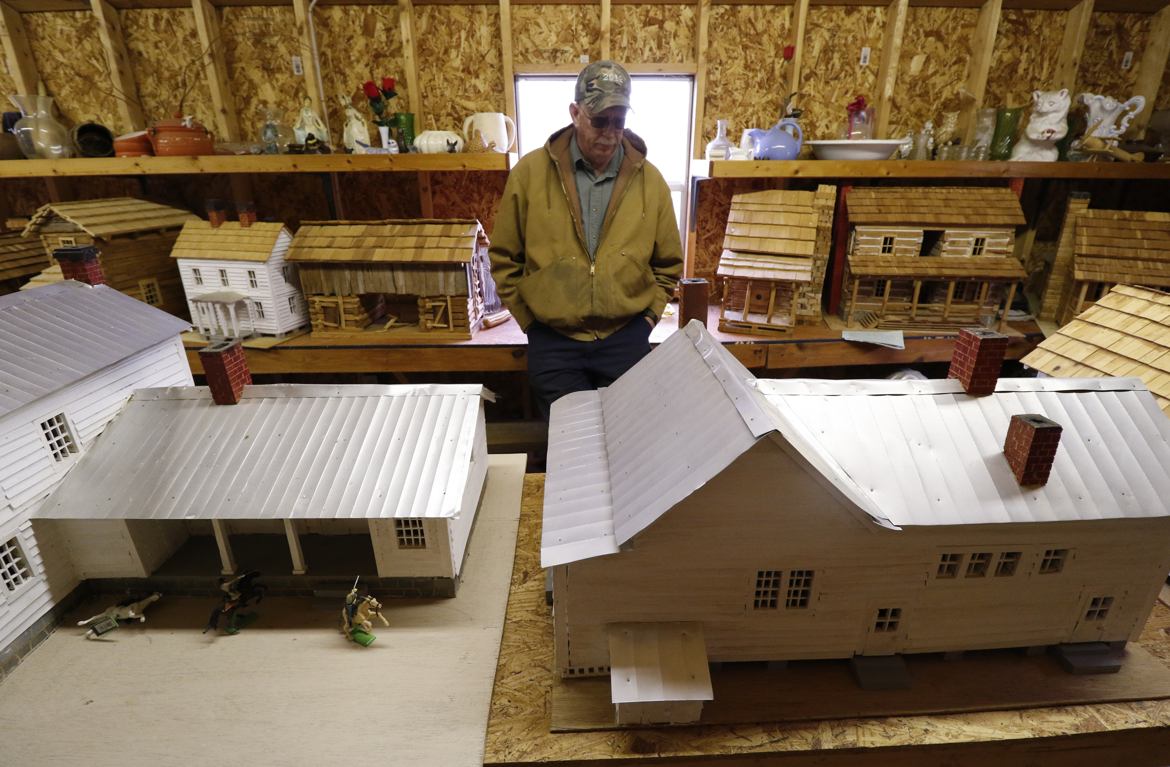 Staff Photo by Dan Henry / The Chattanooga Times Free Press- 11/25/15. John Kell, speaks about his late father Thaxton Kell, who built miniature replicas of structures that were present in the Sequatchie Valley and surrounding areas when he was younger.
