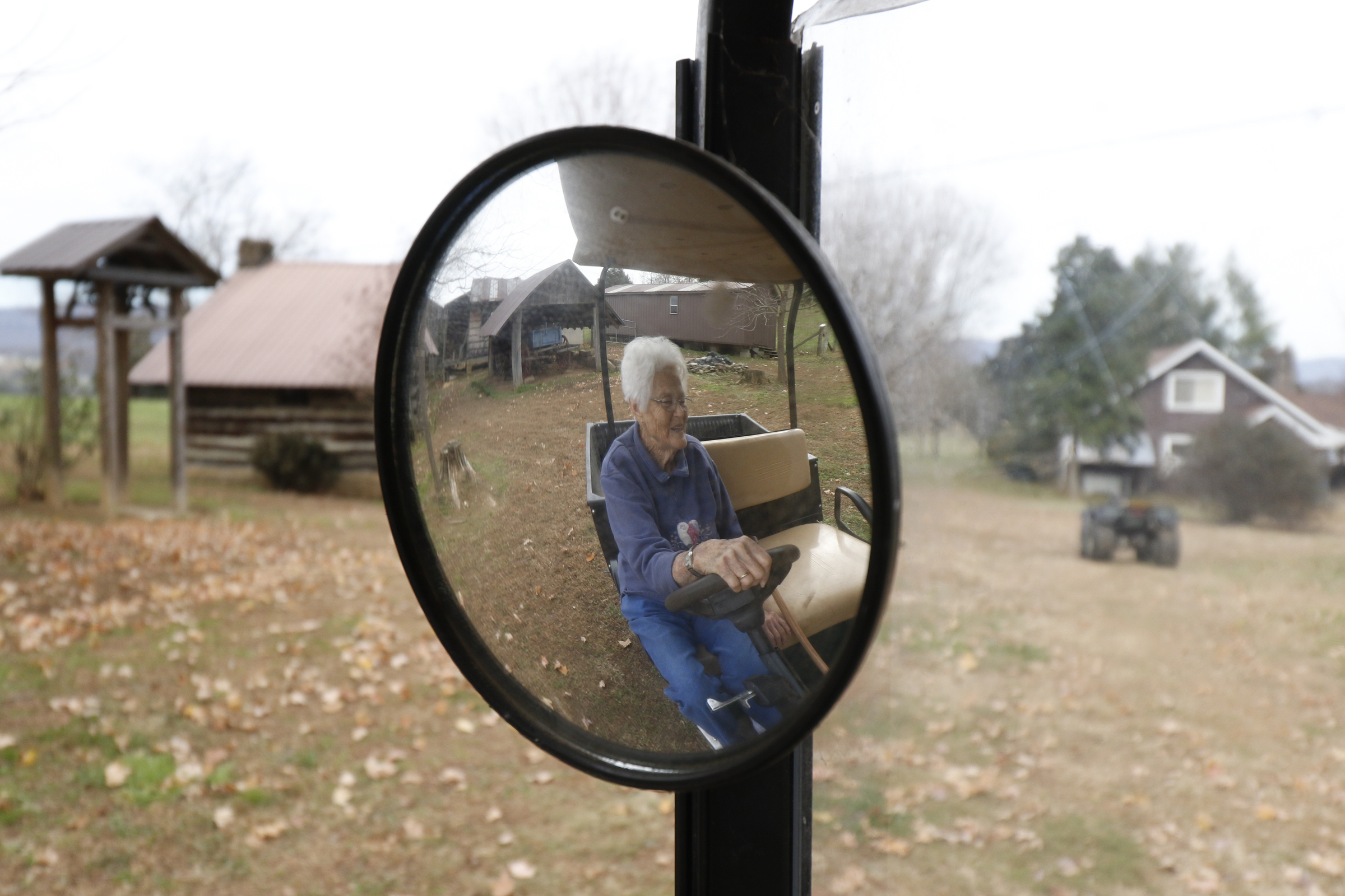 Staff Photo by Dan Henry / The Chattanooga Times Free Press- 11/25/15. Nadean Kell, uses a golf cart to make her way to a shed that houses miniature replicas of structures that her late husband Thaxton Kell built depicting the Sequatchie Valley and surrounding areas.