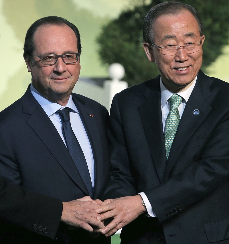 
              United Nations Secretary General Ban Ki-moon, right, and French President Francois Hollande arrive to welcome world leaders for the COP21, United Nations Climate Change Conference, in Le Bourget, outside Paris, Monday, Nov. 30, 2015. (AP Photo/Christophe Ena, Pool)
            