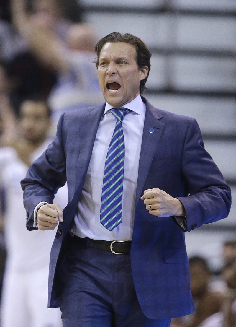 
              Utah Jazz head coach Quin Snyder shouts to his team in the second quarter during an NBA basketball game against the Golden State Warriors Monday, Nov. 30, 2015, in Salt Lake City.  (AP Photo/Rick Bowmer)
            