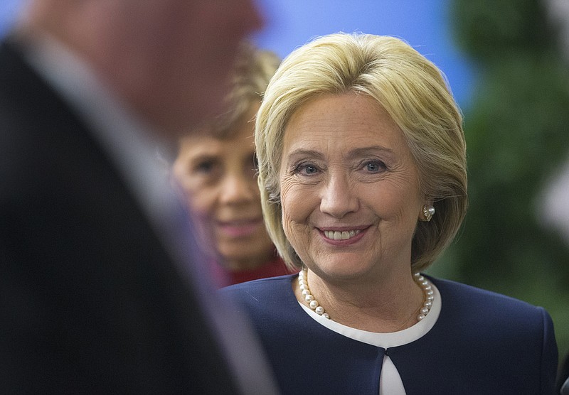 
              Democratic presidential candidate Hillary Clinton smiles as she walks off-stage after speaking at the Atlantic Council Women’s Leadership in Latin America Initiative in Washington, Monday, Nov. 30, 2015. (AP Photo/Pablo Martinez Monsivais)
            