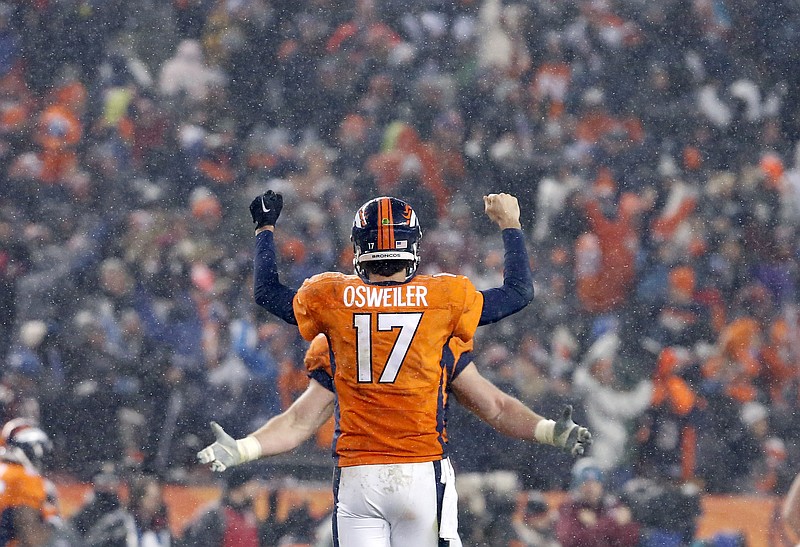 
              Denver Broncos quarterback Brock Osweiler (17) celebrates the game winning touchdown during overtime of an NFL football game against the New England Patriots, Sunday, Nov. 29, 2015, in Denver. The Broncos defeated the Patriots 30-24. (AP Photo/Joe Mahoney)
            
