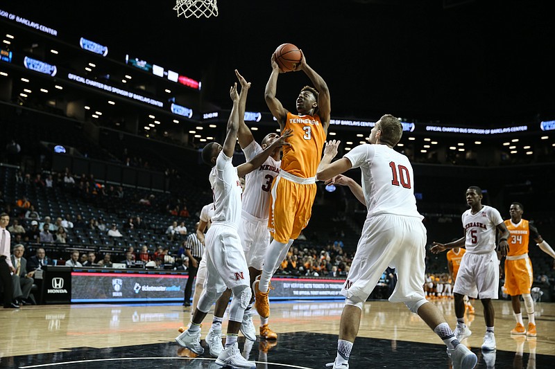 Tennessee's Robert Hubbs III shoots in the lane against Nebraska in the consolation game of the Barclays Center Classic in Brooklyn on Nov. 29, 2015. (Photo By Craig Bisacre/Tennessee Athletics)