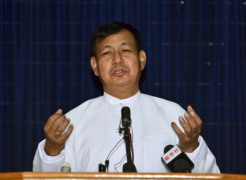 
              Myanmar Information Minister and Presidential spokesman Ye Htut speaks to journalists during a press briefing at the ministry after meeting between Myanmar President Thein Sein and opposition leader Aung San Suu Kyi, in Naypyitaw, Myanmar Wednesday, Dec. 2, 2015. Suu Kyi met Myanmar's outgoing president on Wednesday to discuss the transfer of power following her party's landslide election win. (AP Photo/Aung Shine Oo)
            