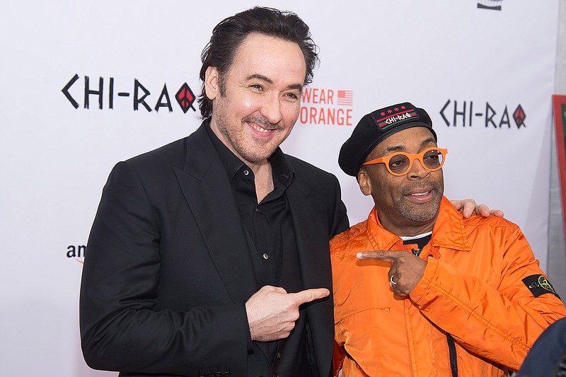 
              John Cusack, left, and Spike Lee attend the premiere of "Chi-Raq" at the Ziegfeld Theatre on Tuesday, Dec. 1, 2015, in New York. (Photo by Charles Sykes/Invision/AP)
            