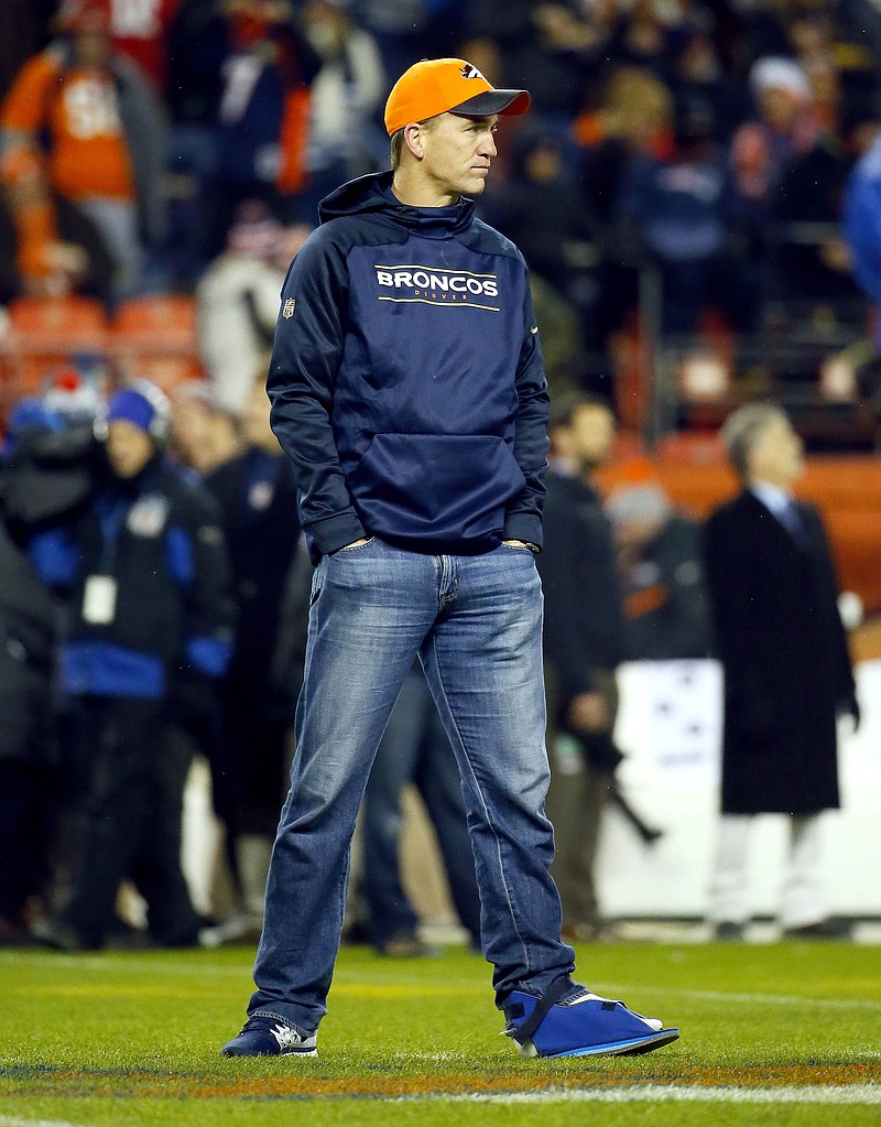 
              Denver Broncos injured quarterback Peyton Manning watches prior to an NFL football game against the New England Patriots, Sunday, Nov. 29, 2015, in Denver. (AP Photo/Jack Dempsey)
            