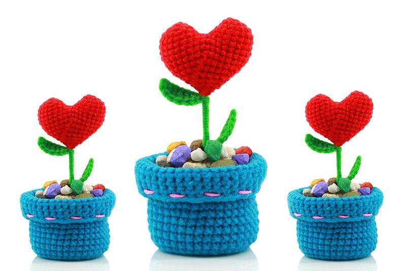 handmade crochet heart on white background