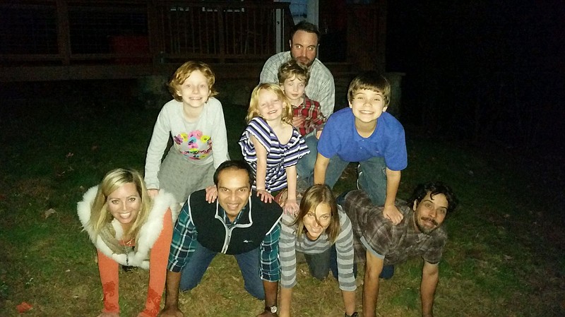 Aunts, uncles, cousins and friends had fun making a human pyramid on Thanksgiving Day at the Nazor Hill household.
