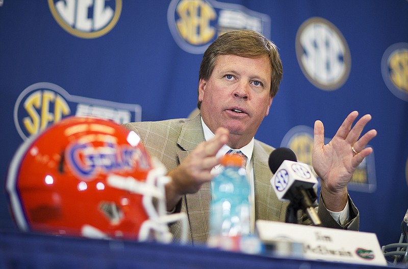 Florida head coach Jim McElwain speaks during a press conference ahead of Saturday's Southeastern Conference championship NCAA college football game against Alabama, Friday, Dec. 4, 2015, in Atlanta. (AP Photo/David Goldman)