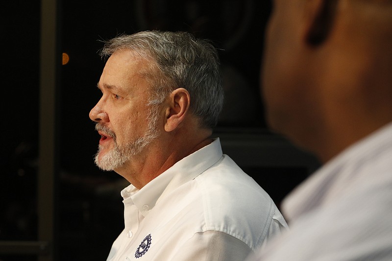 Staff Photo by Dan Henry / The Chattanooga Times Free Press- 12/4/15. Mike Cantrell, left, president of UAW Local 42, and Ray Curry, director of Region 8, announce the results of an election in which 152 Volkswagen workers voted to join the United Auto Workers union for collective bargaining purposes by 71 percent on Friday, December 4, 2015. 