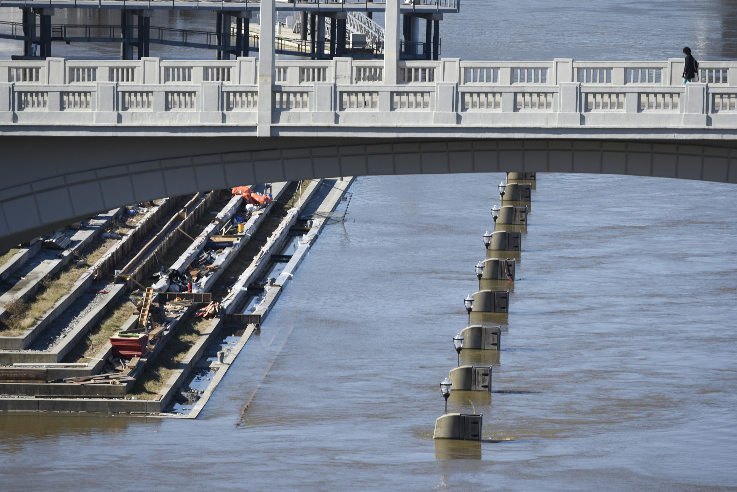 Seen Thursday, Dec. 3, 2015, in Chattanooga, Tenn., the rising level of the Tennessee River has covered the dock and lower steps at the 21st Century Waterfront at Ross's Landing.