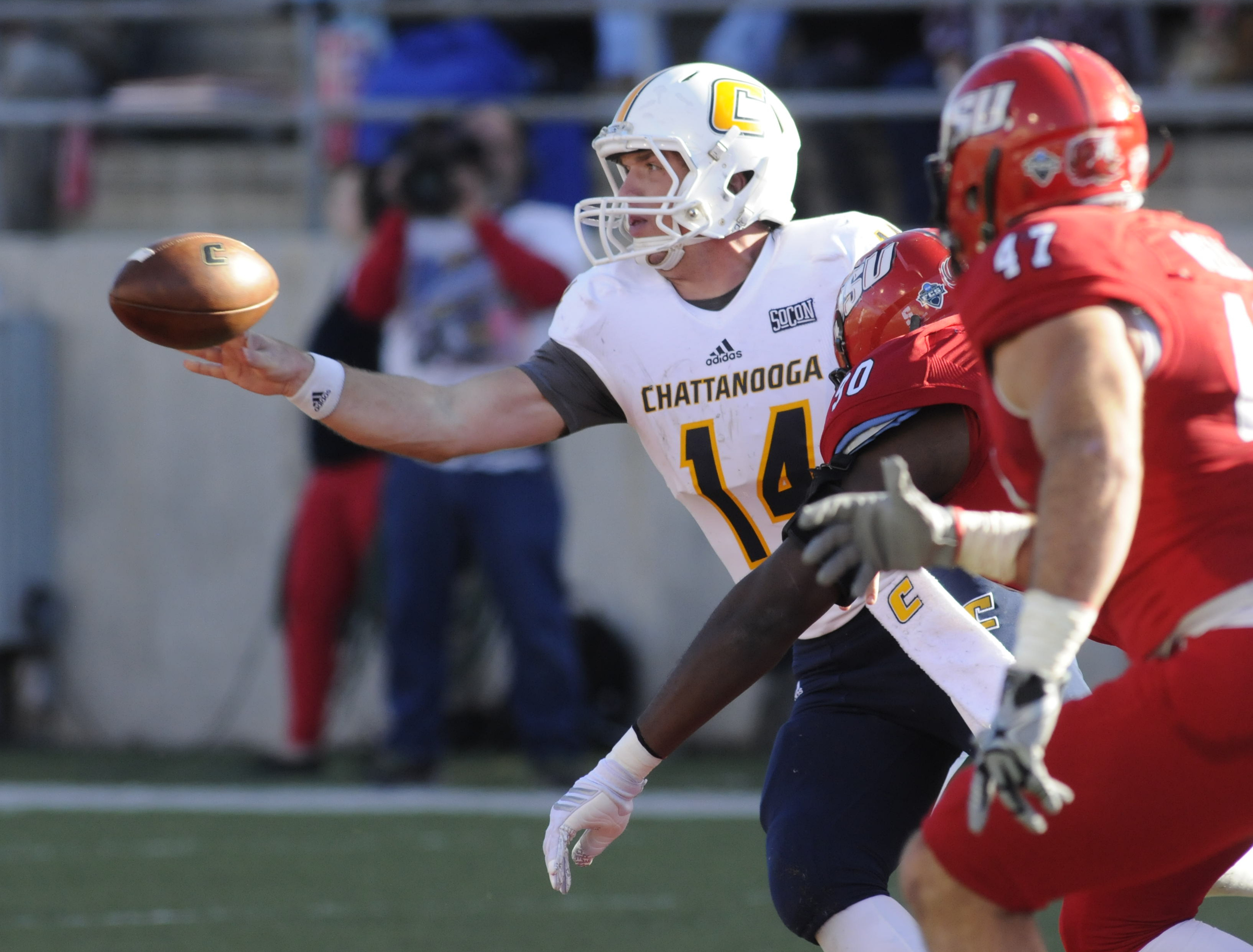 Jacob Huesman (14) pitches to avoid a loss in first half action at Jacksonville State.