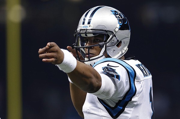 Carolina Panthers quarterback Cam Newton (1) breaks free from