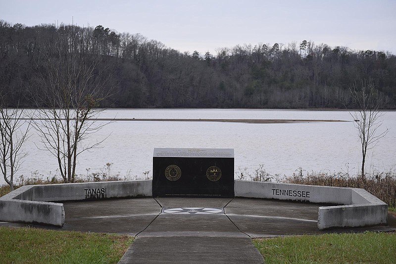 The Tanasi Memorial is located about 12 miles south of the Sequoyah Birthplace Museum in Vonore, Tenn. Tanasi, the state of Tennessee's namesake, is one of two principal Cherokee town sites that are among the subjects of a bill in Congress that seeks to return 76 acres of ancestral land in Monroe County to the Eastern Band of Cherokee Indians. The actual town site is about 300 yards west of this marker.