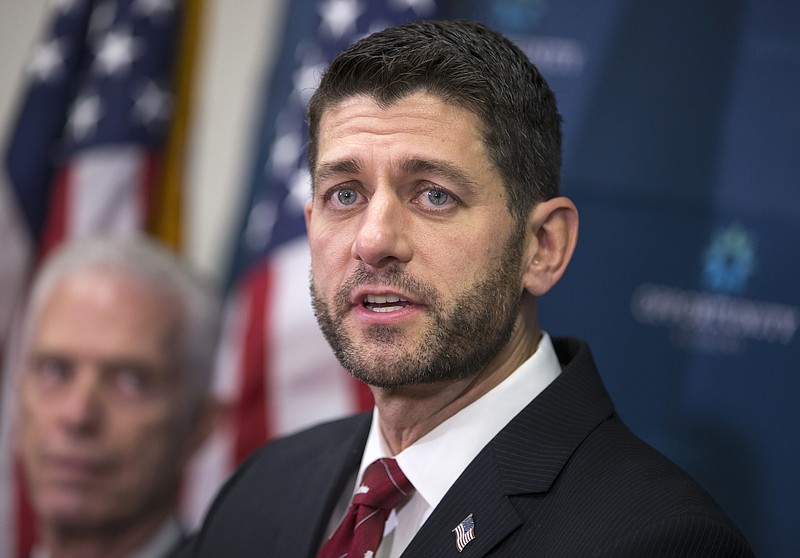 
              In this Dec. 1, 2015, photo, House Speaker Paul Ryan of Wis., meets with reporters following a GOP strategy session on Capitol Hill in Washington. Congressional Republicans are pressing for an end to the four-decade ban on exporting crude oil and further curbs on President Barack Obama’s environmental agenda as part of a sweeping $1.1 trillion spending bill. Days from a Dec. 11 midnight deadline, progress has proven elusive for negotiators who also are trying to hammer out a separate measure to renew dozen of expired tax breaks. The two bills are the major item of unfinished business for this session of Congress. (AP Photo/J. Scott Applewhite)
            