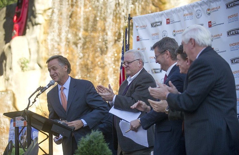 Gov. Bill Haslam greets the crowd when Lifetime Products CEO Richard Henderson and Haslam announced the manufacturing company's relocation to Knoxville on Friday, Nov. 20, 2015.