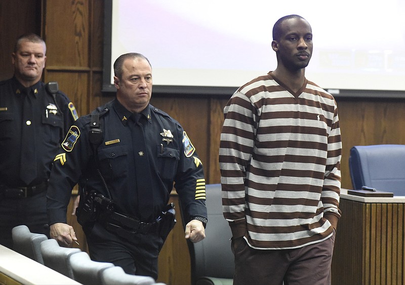 Stephen Lester enters Judge Tom Greenholtz's courtroom on Wednesday, Dec. 9, 2015, in Hamilton County Criminal Court in Chattanooga. Lester is facing multiple charges in the January 2013 shooting death of Edward Glenn, Jr.