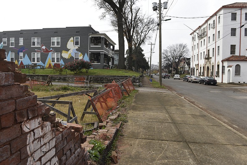 In this view looking south on Mitchell Avenue, a mural adorns an apartment building seen at left in the Southside area on Thursday, Dec. 10, 2015, in Chattanooga, Tenn. 