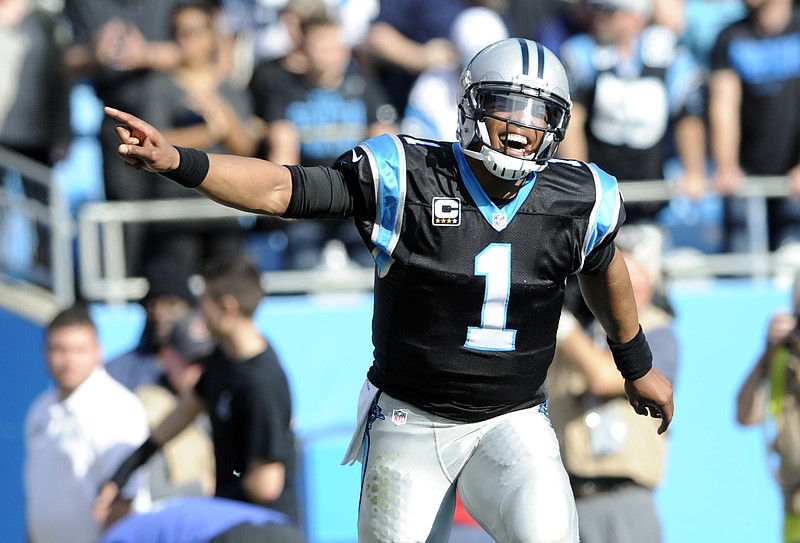 
              Carolina Panthers' Cam Newton (1) celebrates after a touchdown against the Atlanta Falcons in the first half of an NFL football game in Charlotte, N.C., Sunday, Dec. 13, 2015. (AP Photo/Mike McCarn)
            