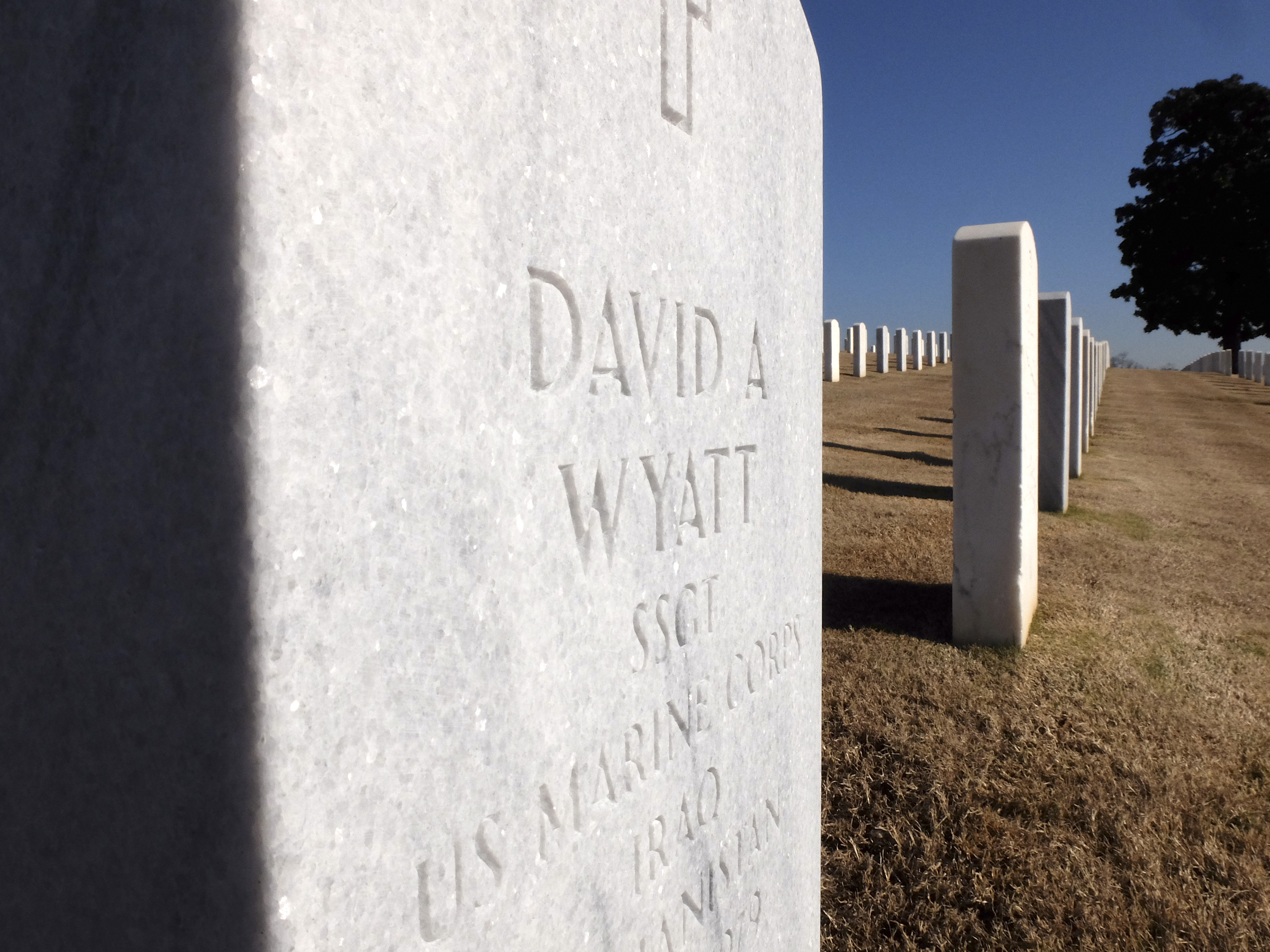 Marine SSgt David A. Wyatt is buried beside U.S. Navy LS2 Randall Scott Smith at the Chattanooga National Cemetery.