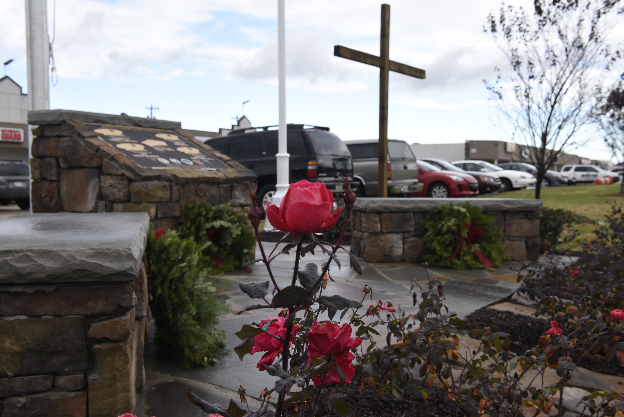 The memorial to the five service members killed in a terror incident on July 16, 2015, is photographed on Monday, Dec. 14, 2015, in Chattanooga, Tenn. The memorial is located in front of the Armed Forces Career Center on Lee Highway next to Highway 153, the scene of the first shots fired in the July attack.